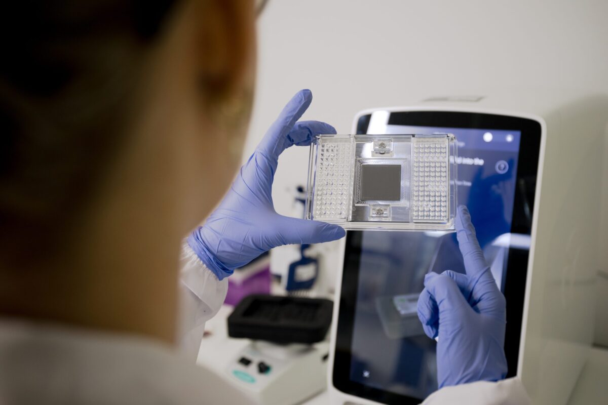 Scientist examining a laboratory sample