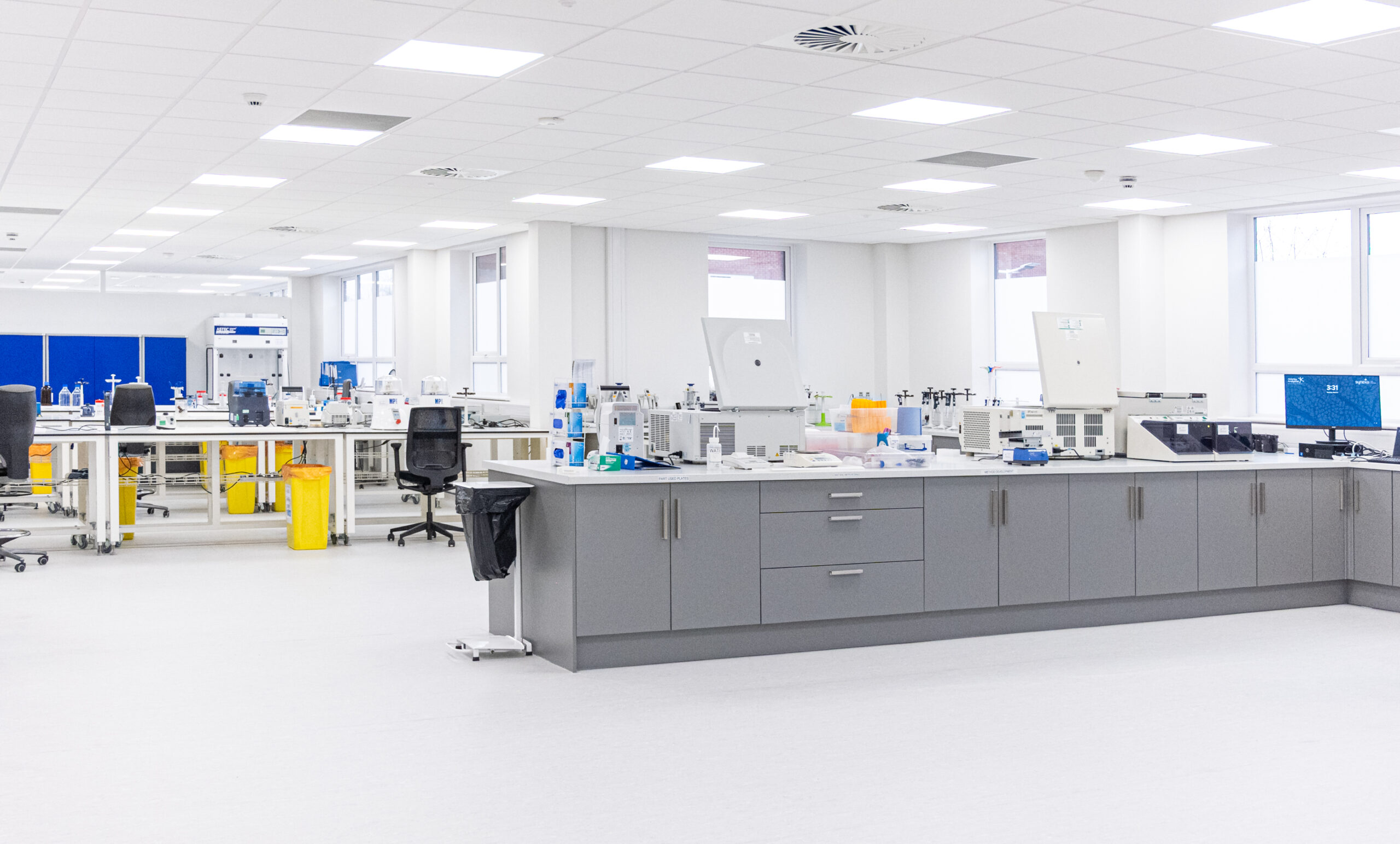 Mass Spec Lab Modern laboratory with clean workspaces.