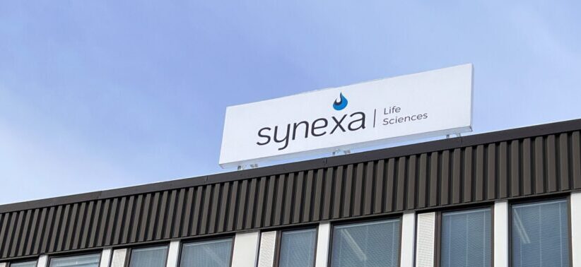 Synexa sign outside building